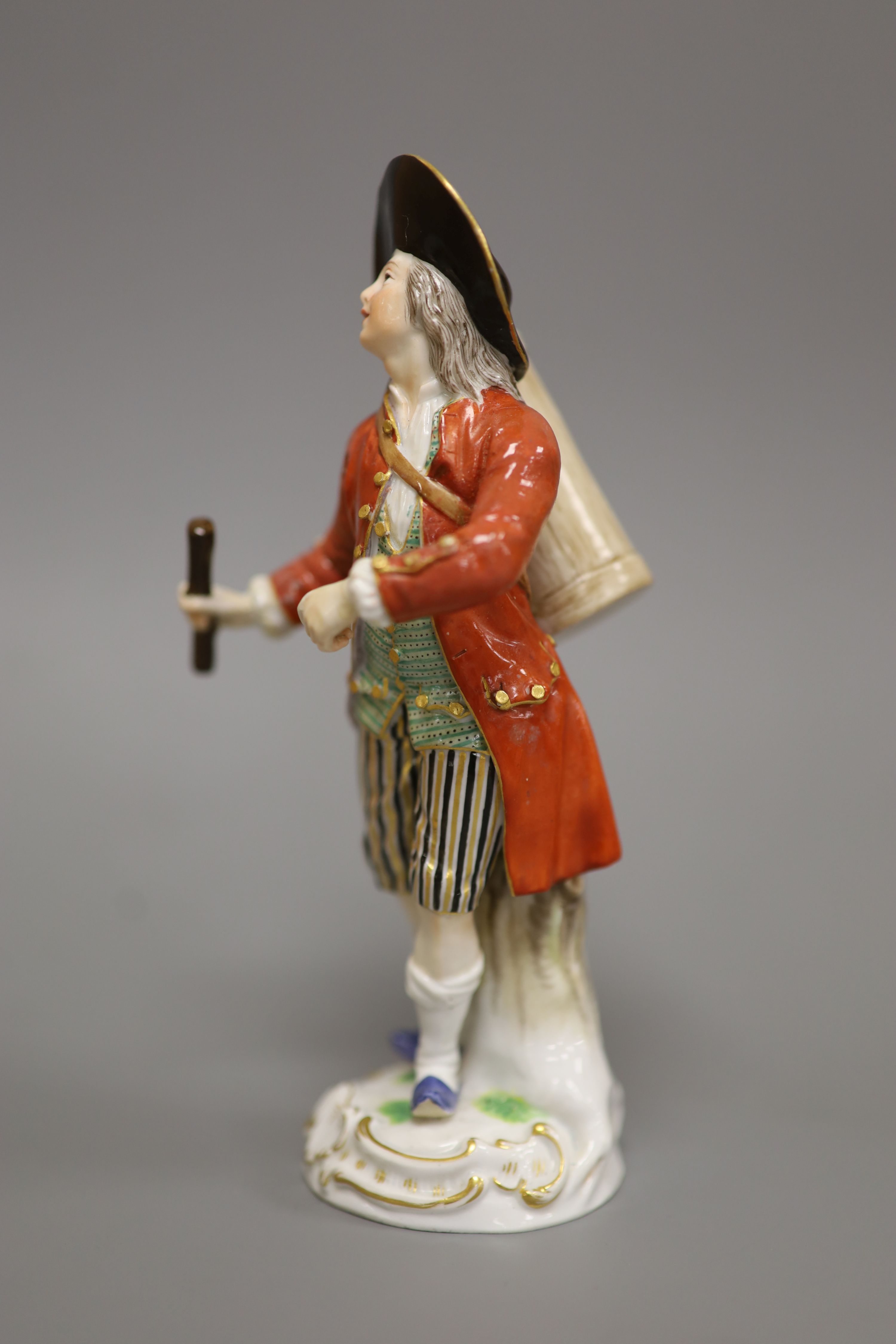 A late Meissen porcelain figure of a drummer boy, polychrome-decorated on scrolled base, height 15cm